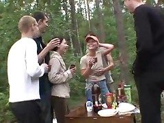 5 men and 2 teen ladies in the woods